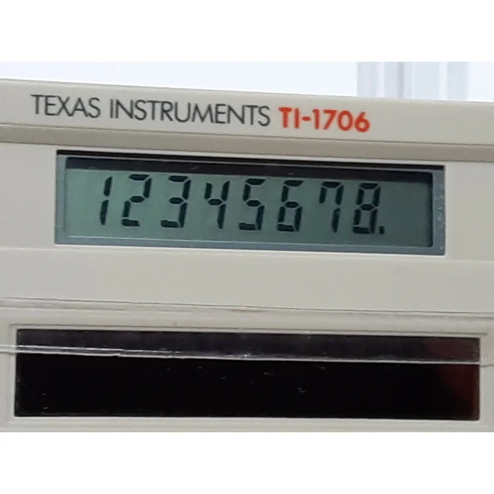 Texas Instruments TI-1706 Vintage Solar Calculator with Tan‎ Wallet Case Tan